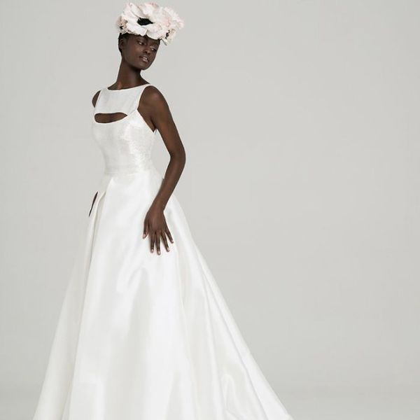 Model in high-neck ballgown with cutout