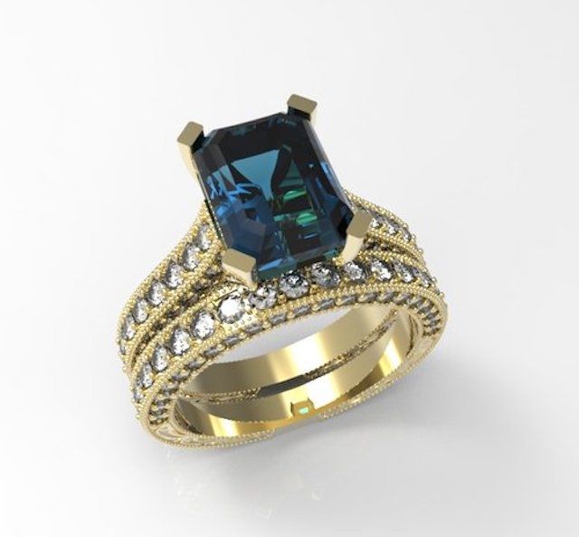 OC珠宝钻石和伦敦蓝托帕石订婚戒指ld乐动官网