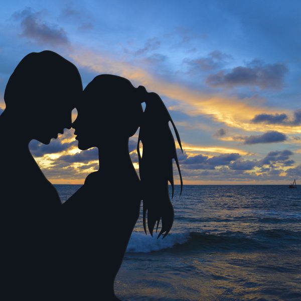 海滩夫妇“class=