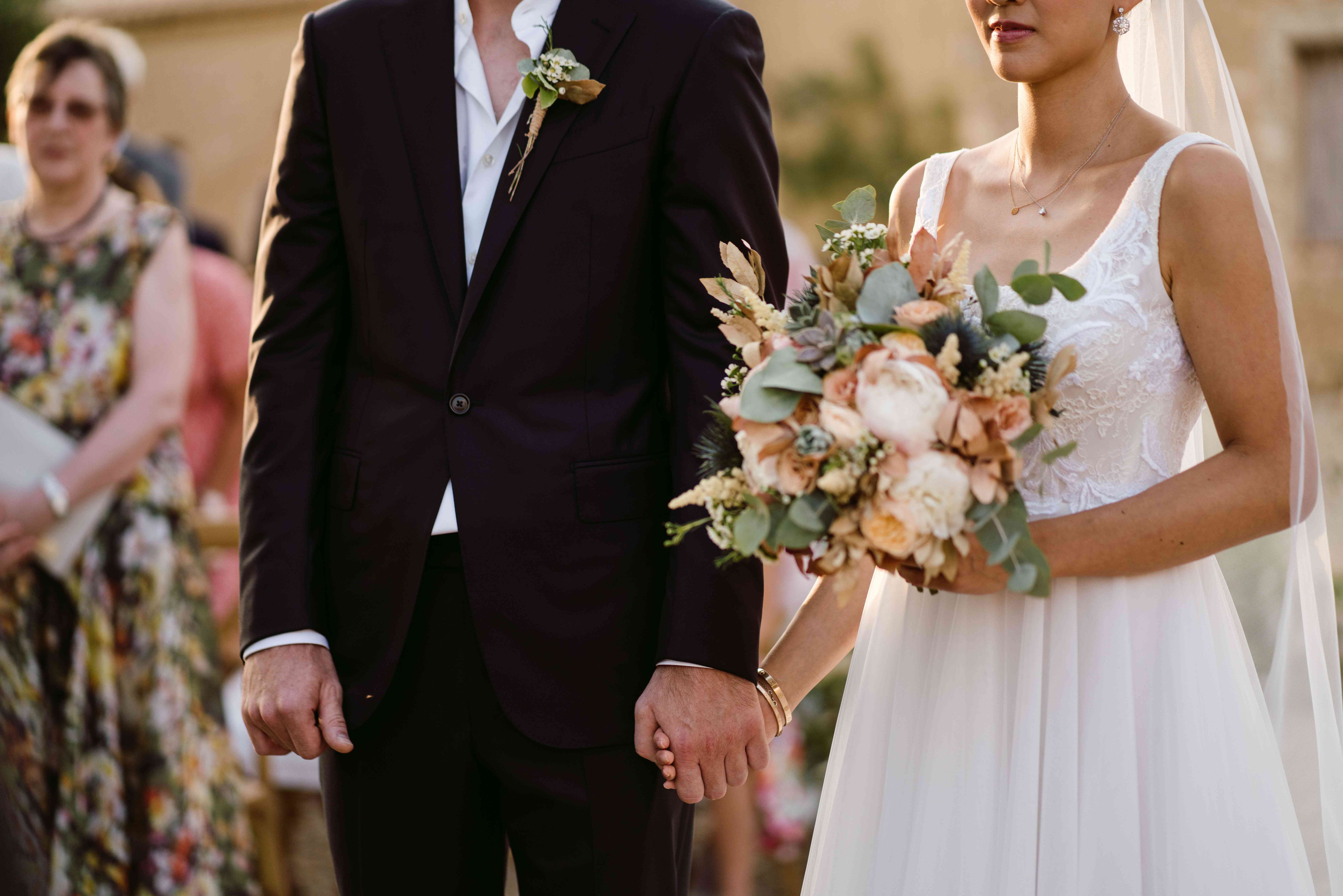 夫妇在仪式上“class=