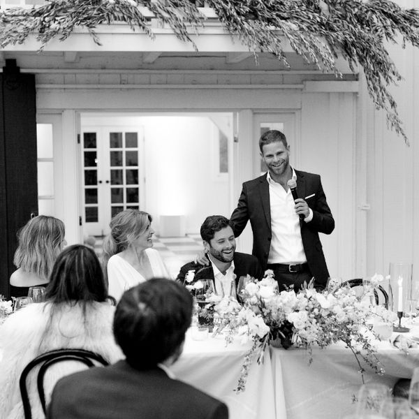 Best man delivering speech at wedding