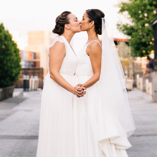 brides kissing